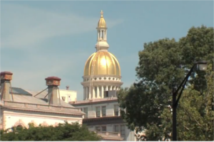 Exterior shot of NJ State House with gold dome.