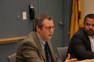 David Bander (left), executive director, Policy Office at New Jersey Department of Labor & Workforce Development, sat down with about 20 business people at NJBIA headquarters for a two-hour question and answer session about the new paid sick leave law. NJBIA’s Michael Wallace listens in.