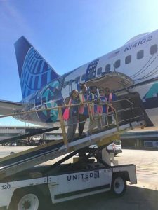 Photo Caption: Young women from the Girl Scouts Heart of New Jersey, the Boys & Girls Club Newark and Boys & Girls Clubs of Union County gathered outside the New York/New Jersey Her Art Here airplane at Newark Liberty International Airport on October 5 in celebration of Girl’s in Aviation Day with United Airlines.
