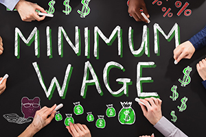 Minimum Wage written on a chalkboard
