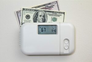 image of money and thermostat