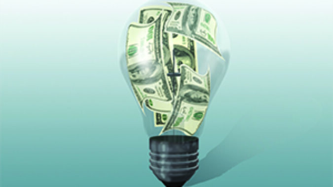 Hundred dollar bills inside a light bulb