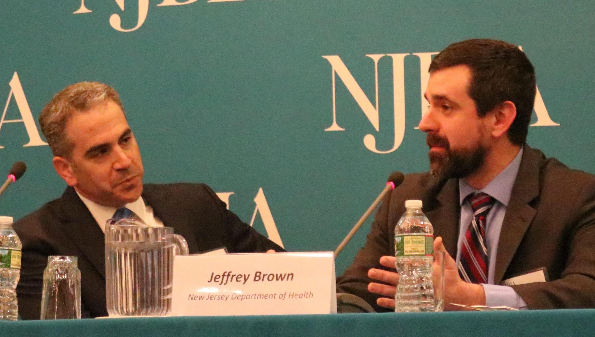 Bill Caruso (left) of Archer Law with Assistant Health Commissioner Jeff Brown at NJBIA's Cannibas seminar discussing policies on legalizing marijuana