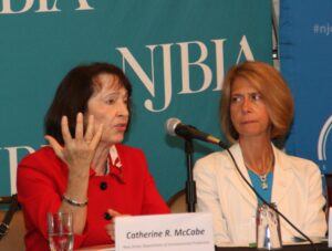 DEP Commissioner Catherine McCabe responds to a question at the June 19 Meet the Decision Makers Event as NJBIA President and CEO Michele Siekerka listens.