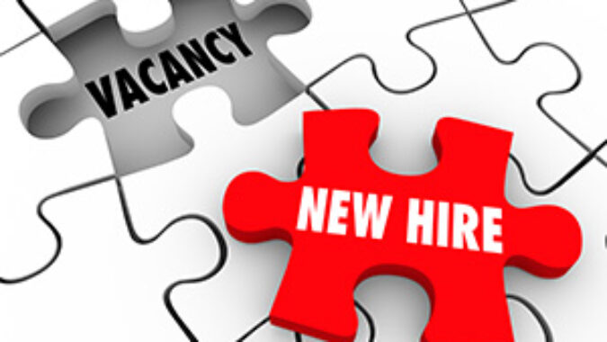 image showing puzzle pieces with the words 'vacancy' and 'new hire'